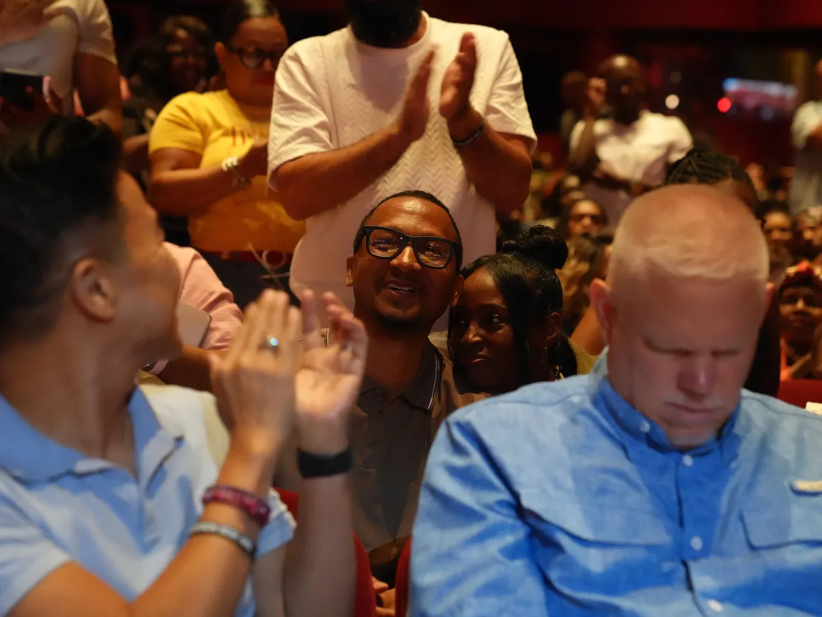 Team NuVision event crowd — watch the last-event highlight on the Culture page